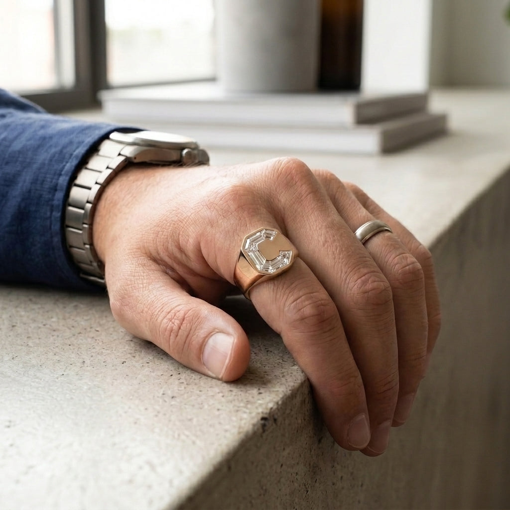 Men's Oval lab-grown diamond letter signet ring in 14K Rose Gold, letter C, worn on hand