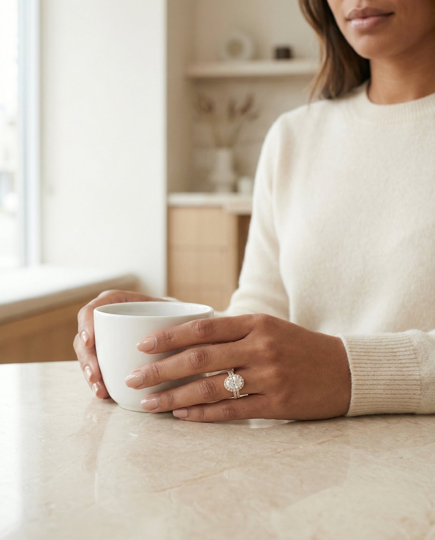 Ella Select micro-pavé triple row halo oval oval ring in 14K Rose Gold — lifestyle — RockHer
