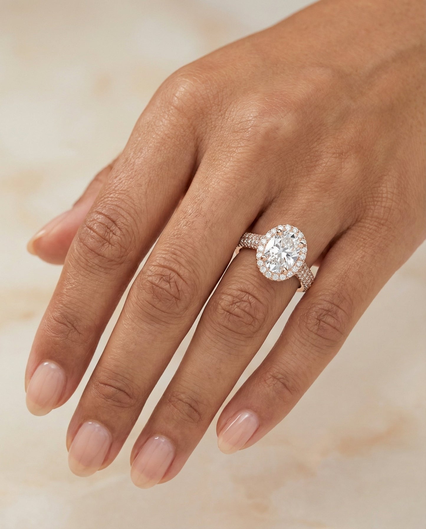 Micro-Pavé Triple Row Halo Oval, in 14K Rose Gold, pave setting – lifestyle shot | RockHer