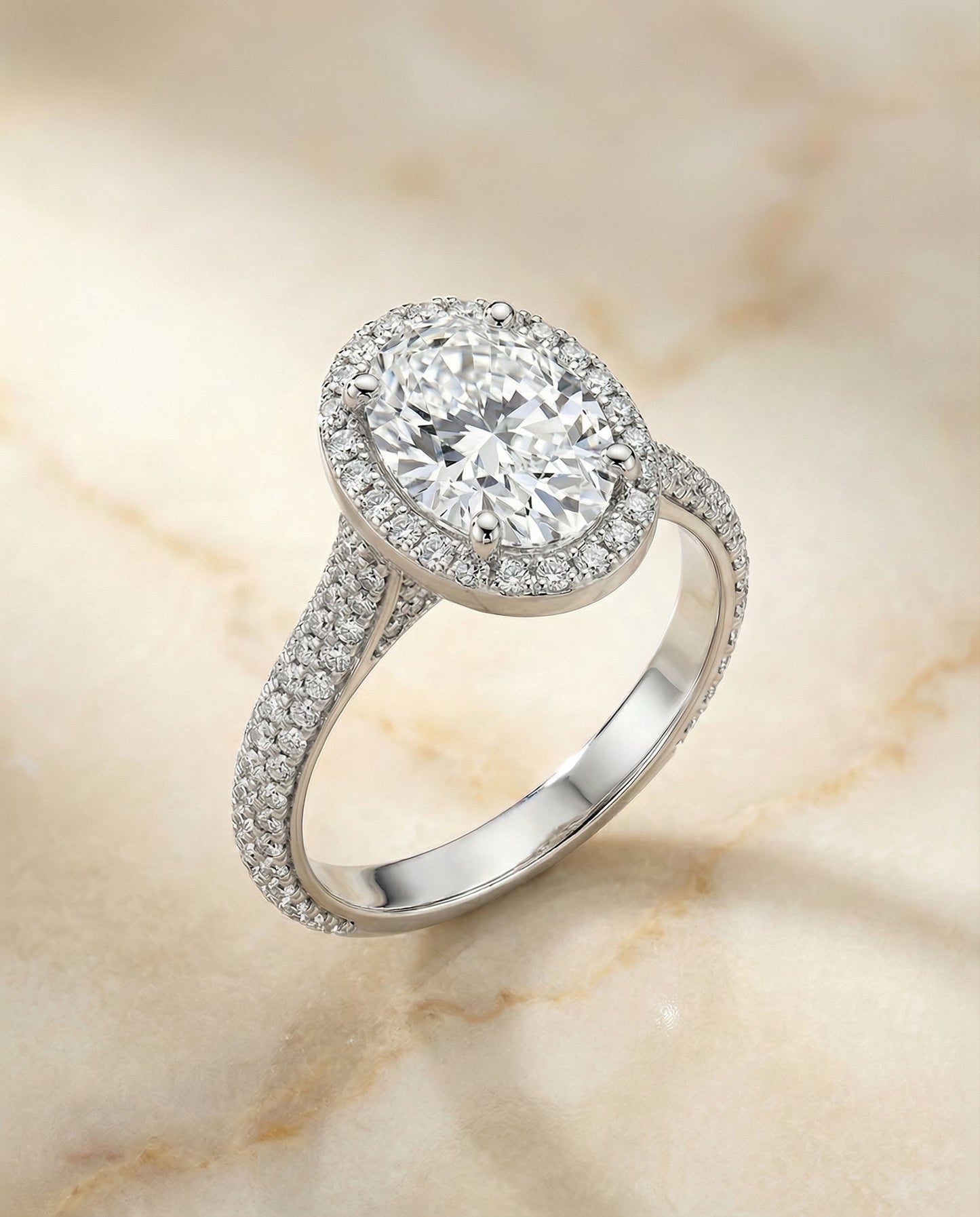 Micro-Pavé Triple Row Halo Oval, in Platinum, pave setting – angled view | RockHer