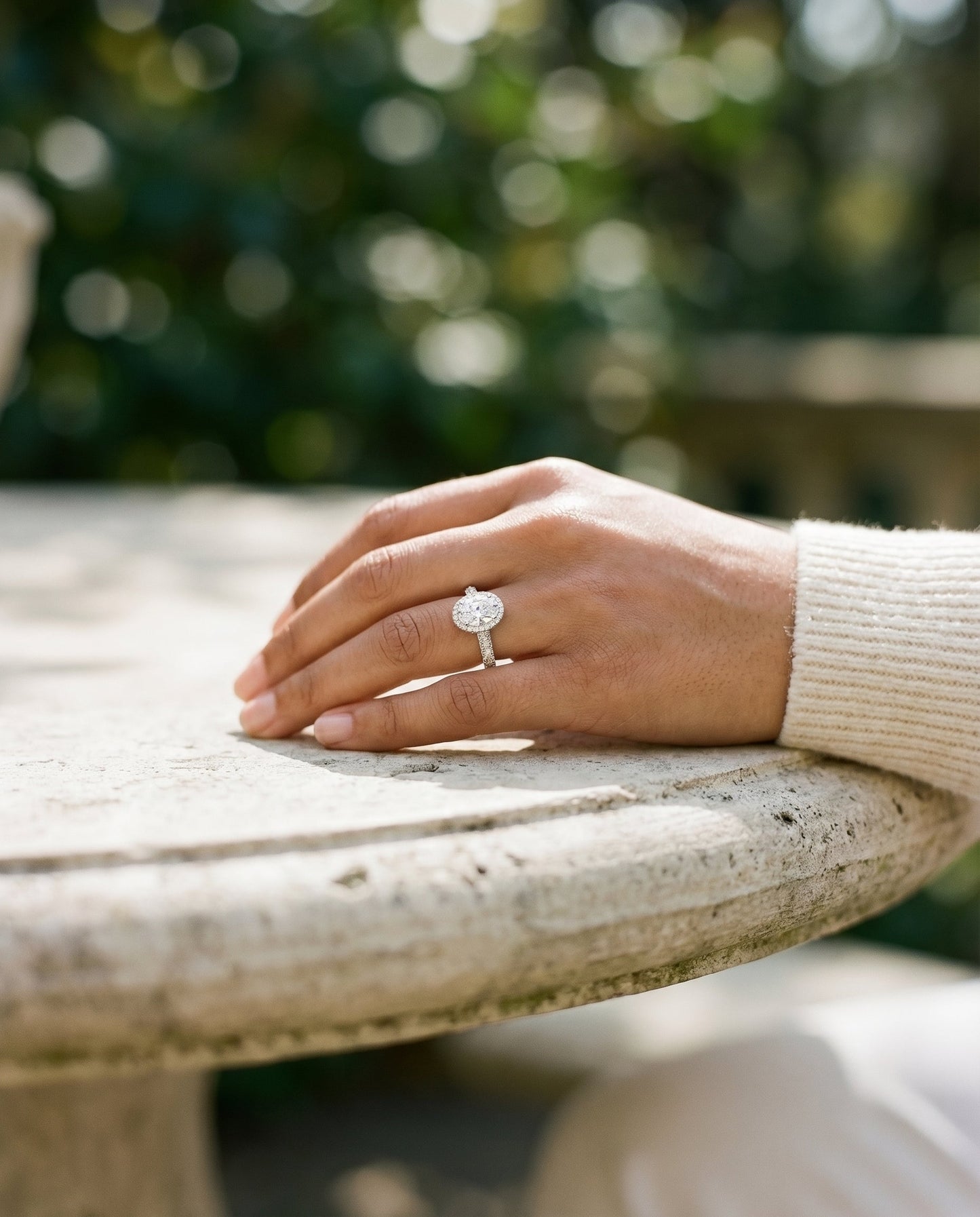 Micro-Pavé Triple Row Halo Oval, in Platinum, pave setting – lifestyle shot | RockHer