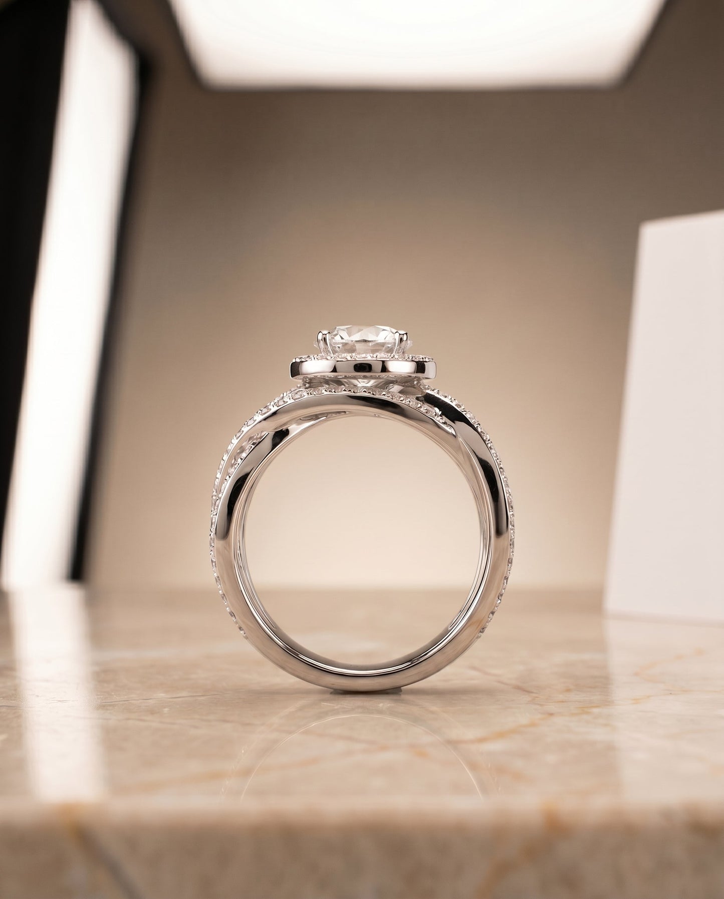 Round Brilliant, Open Intertwined Pavé Row, in Platinum – side profile | RockHer