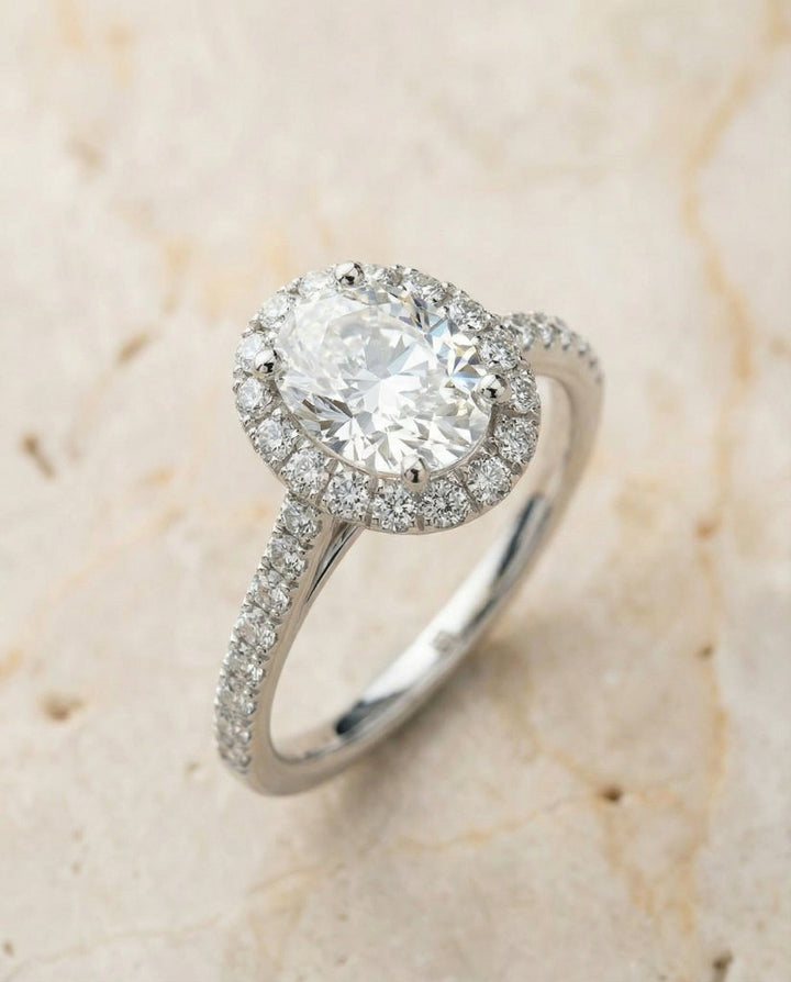 Petite French Pavé Halo Oval, in Platinum, pave setting – angled view | RockHer