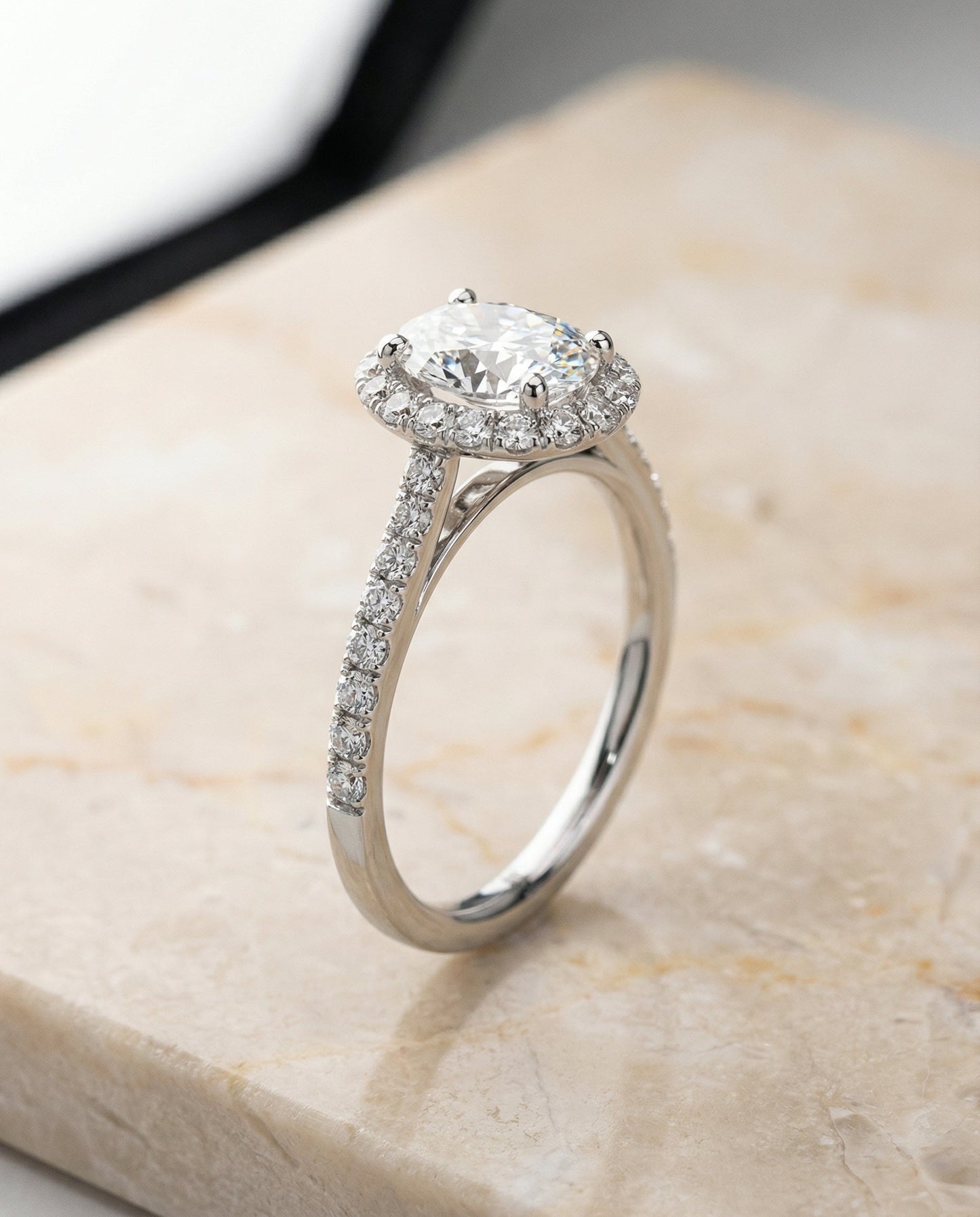 Dylan Select petite french pavé halo oval ring in 14K White Gold — front — RockHer