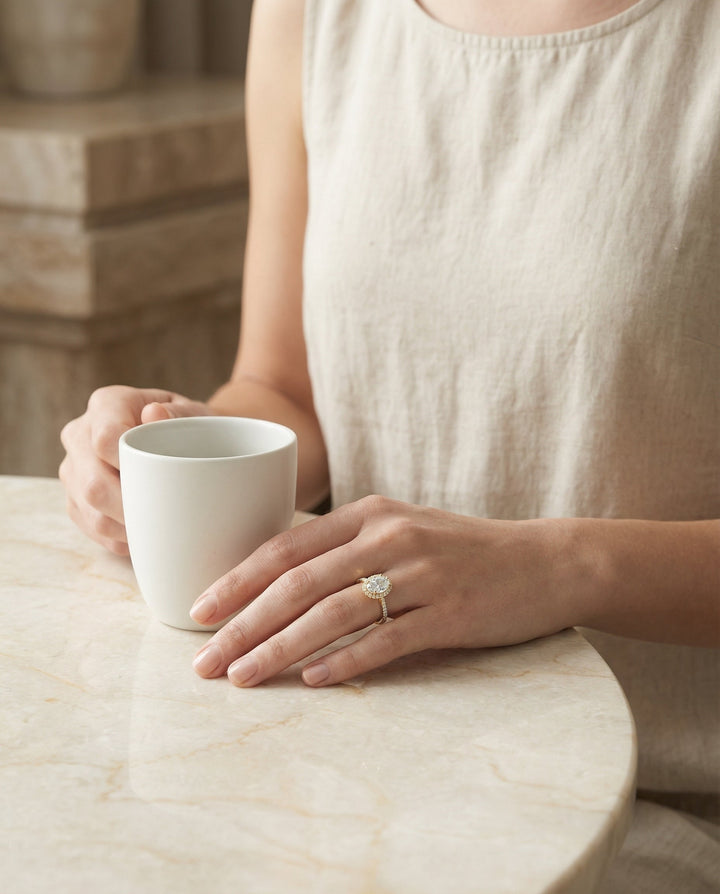 Petite French Pavé Halo Oval, in 18K Yellow Gold, pave setting – lifestyle shot | RockHer