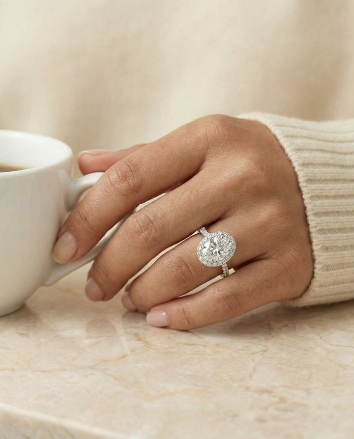 Dylan Select Petite French Pavé Halo Oval Engagement Ring, in 18K White Gold, pave setting – lifestyle shot | RockHer