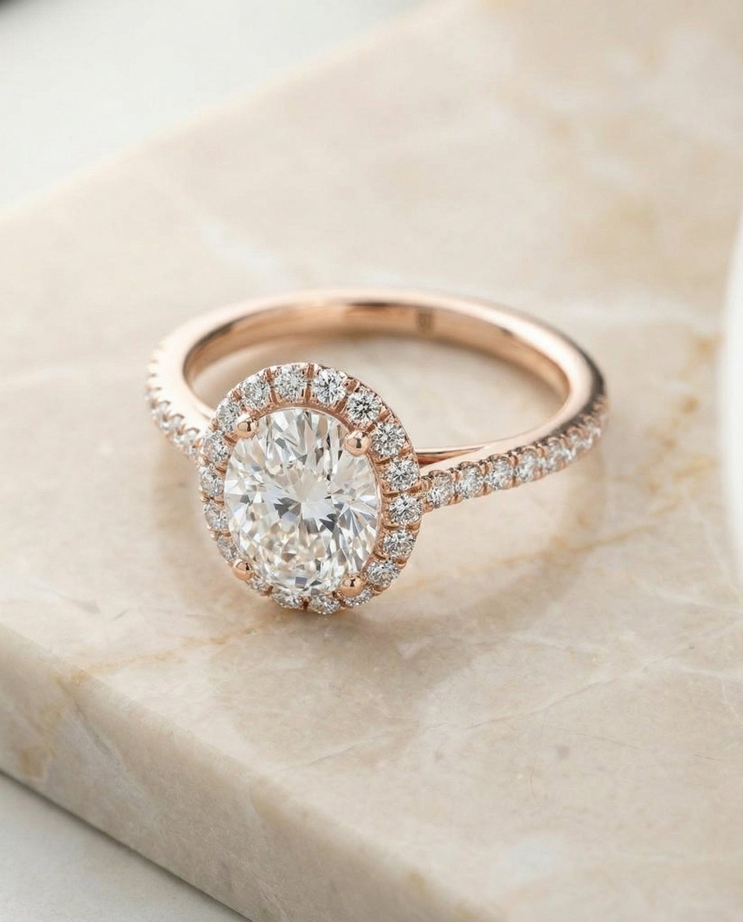 Petite French Pavé Halo Oval, in 14K Rose Gold, pave setting – angled view | RockHer