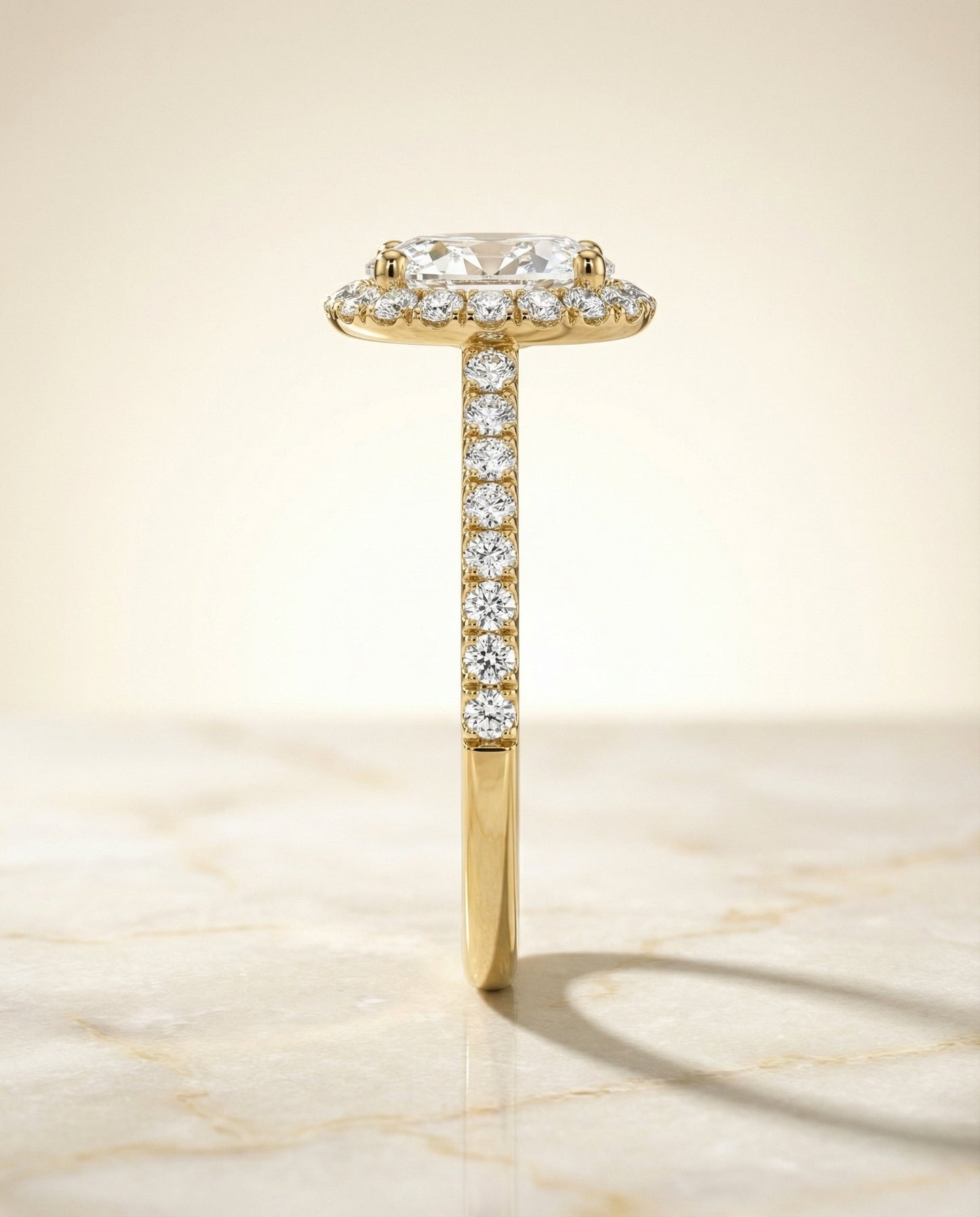 Petite French Pavé Halo Oval, in 18K Yellow Gold, pave setting – side profile | RockHer