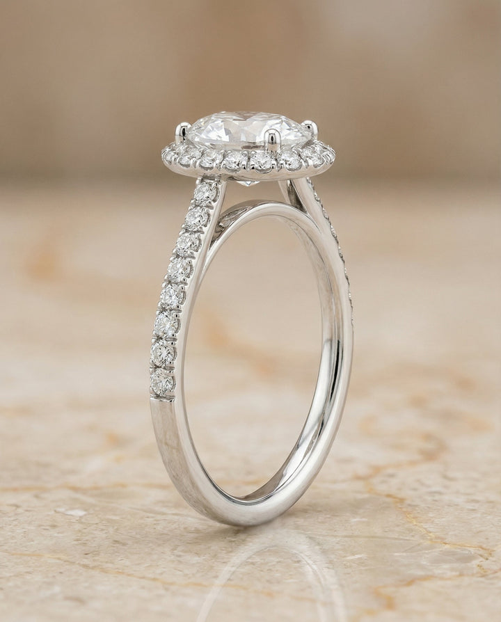Dylan Select Petite French Pavé Halo Oval Engagement Ring, in Platinum, pave setting – side profile | RockHer