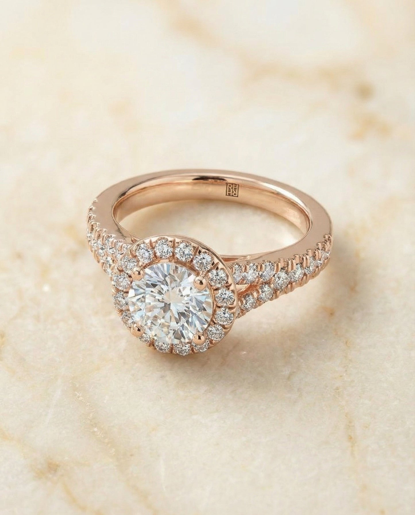 Round Brilliant, Petite Split Shank Halo, in 14K Rose Gold, pave setting – angled view | RockHer