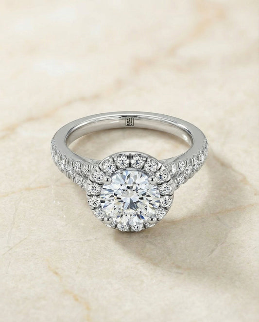 Round Brilliant, Petite Split Shank Halo, in Platinum, pave setting – angled view | RockHer