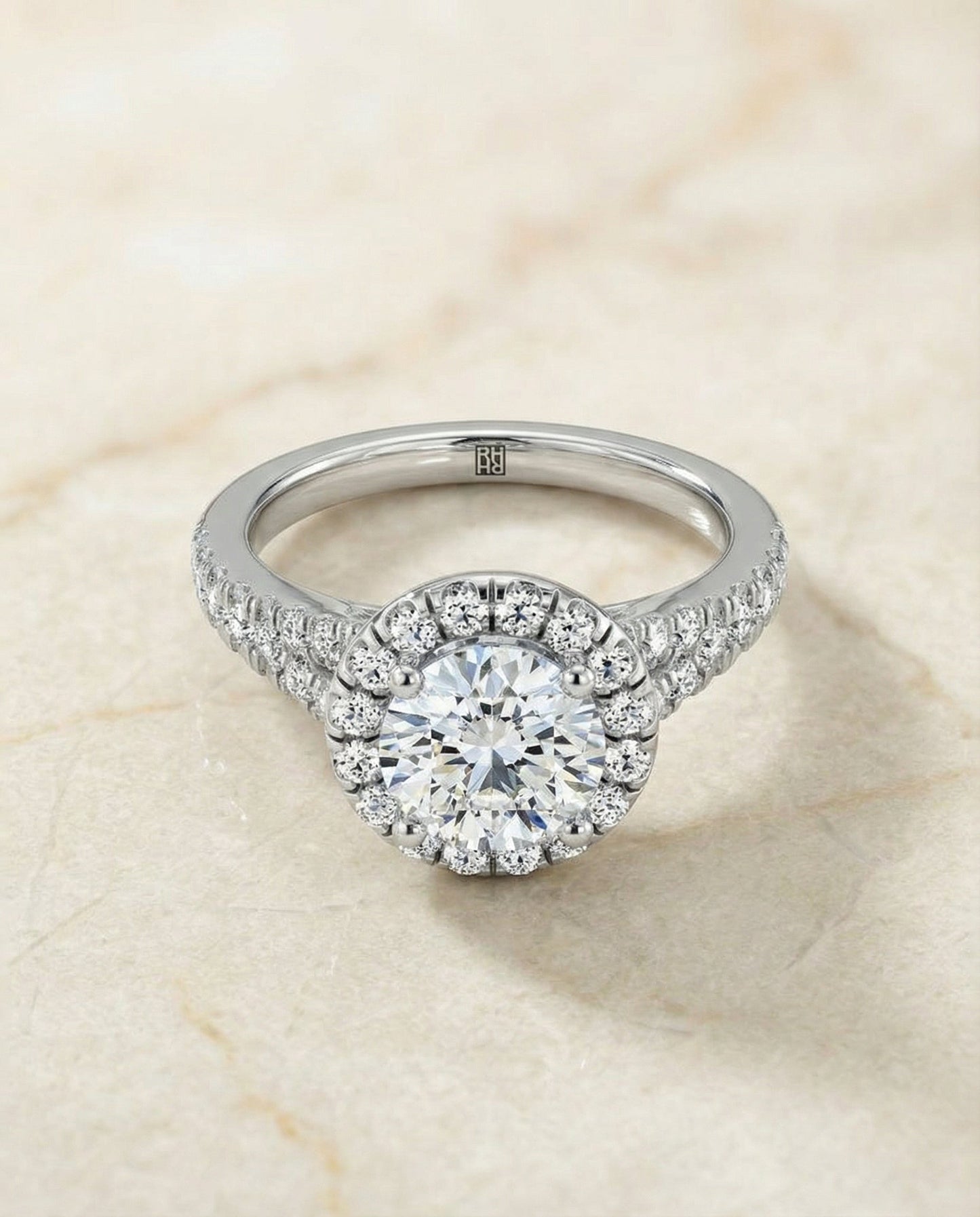 Round Brilliant, Petite Split Shank Halo, in Platinum, pave setting – angled view | RockHer