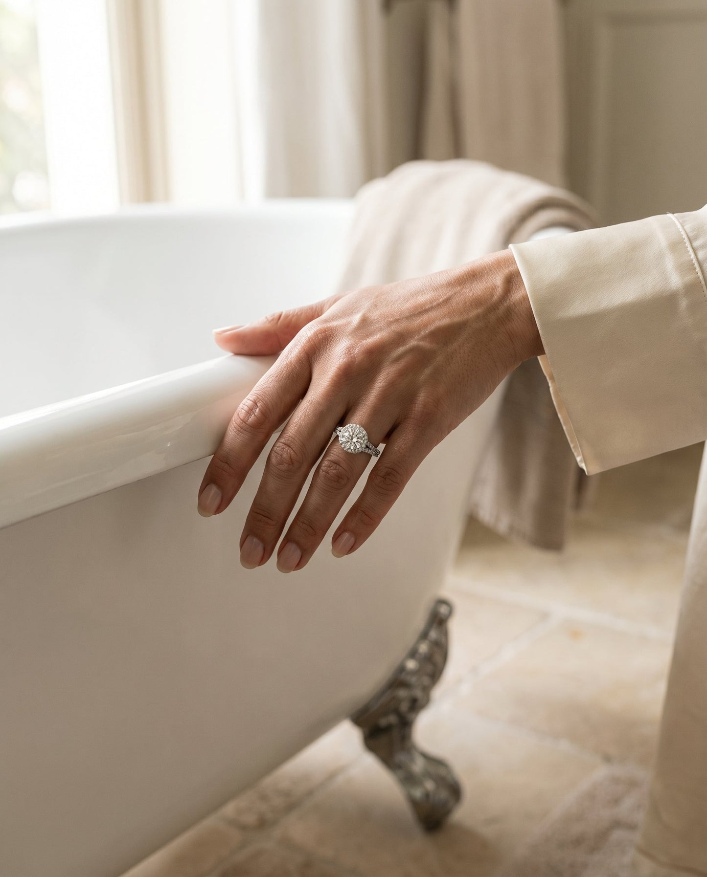 Round Brilliant, Petite Split Shank Halo, in Platinum, pave setting – lifestyle shot | RockHer