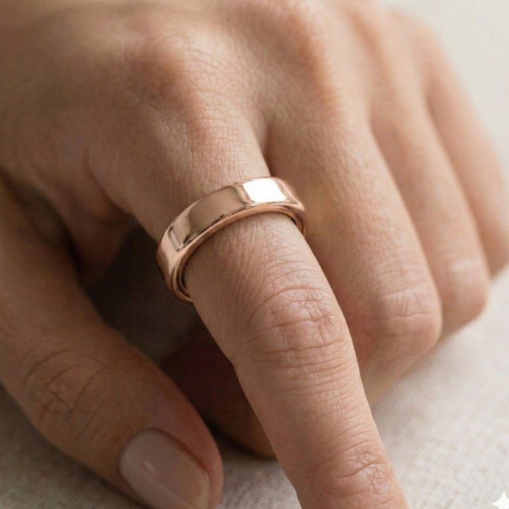 Polished Gold Cover for Oura Ring, in 14K Rose Gold – lifestyle shot | RockHer