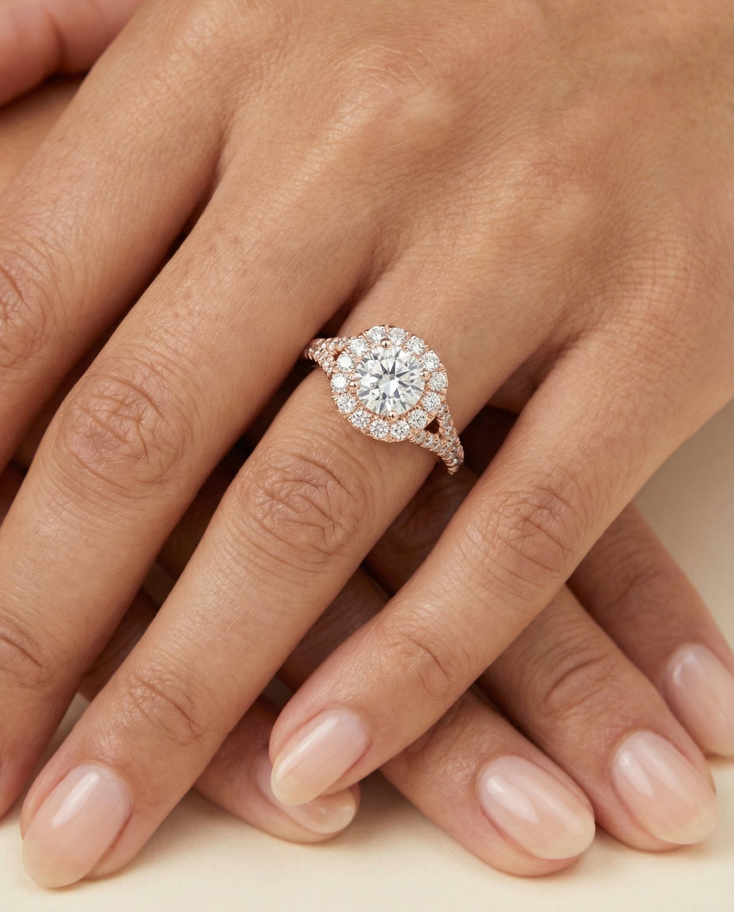 Prong Halo Split Shank Cushion, in 14K Rose Gold, pave setting – lifestyle shot | RockHer