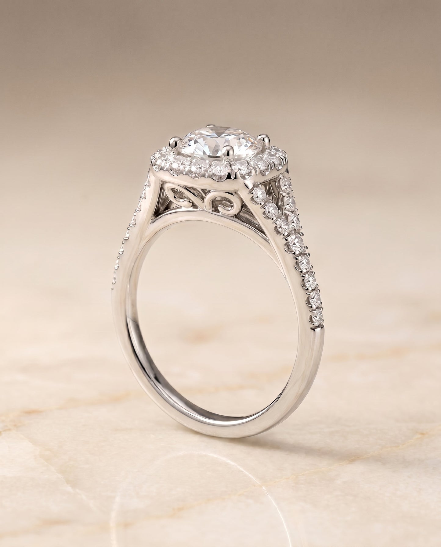 Prong Halo Split Shank Cushion, in Platinum, pave setting – angled view | RockHer