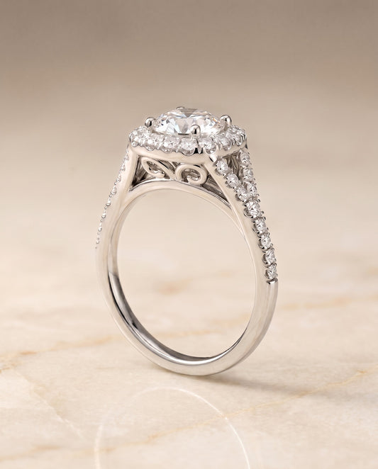 Prong Halo Split Shank Cushion, in Platinum, pave setting – angled view | RockHer