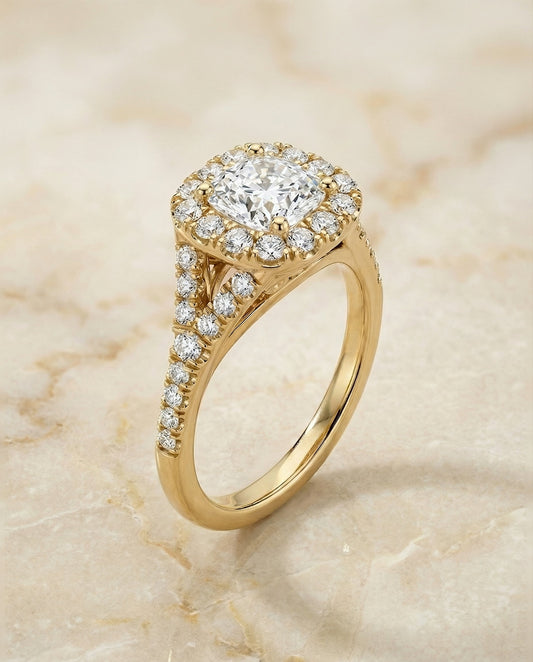 Prong Halo Split Shank Cushion, in 18K Yellow Gold, pave setting – angled view | RockHer