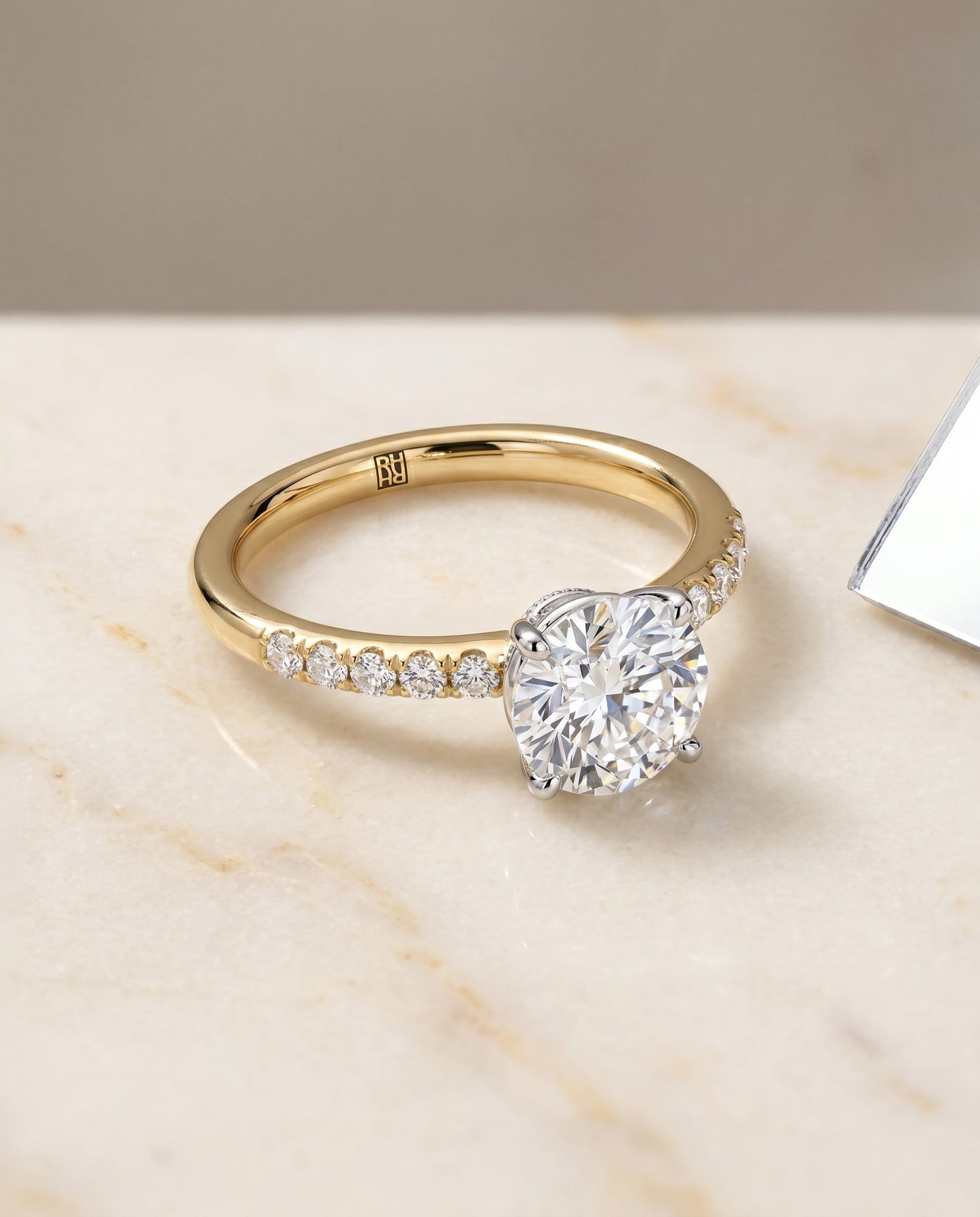 The Cherie Hidden Halo Solitaire Engagement Ring Setting for Round Diamonds in 18K Yellow Gold | RockHer