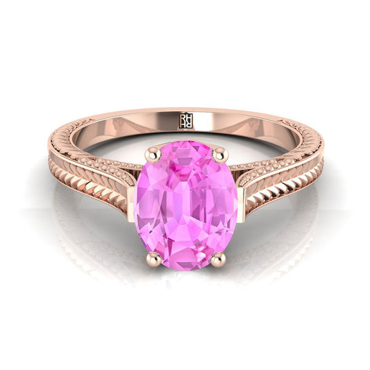 แหวนหมั้นเดี่ยวสไตล์วิหารวินเทจสลักมือ รูปไข่ประดับแซฟไฟร์สีชมพู ทองกุหลาบ 14K
