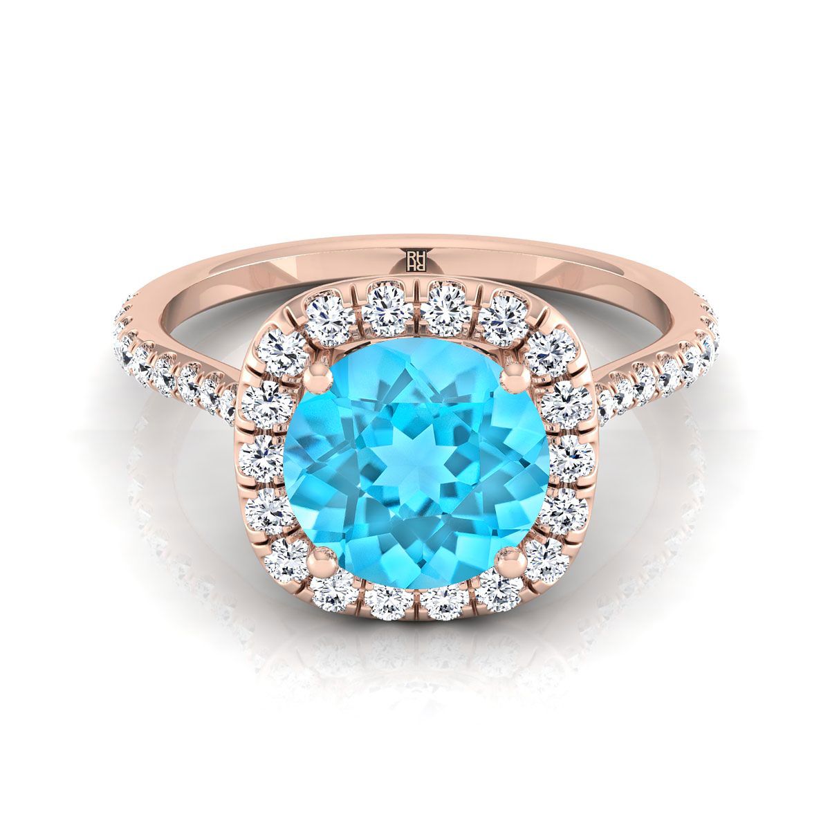 แหวนหมั้นทองคำ 14K โรสโกลด์ ประดับทับทิมสวิสสีน้ำเงินทรงกลมเจียระไนแบบ Brilliant พร้อมเพชรล้อมแบบ Shared Prong Halo - 3/8ctw