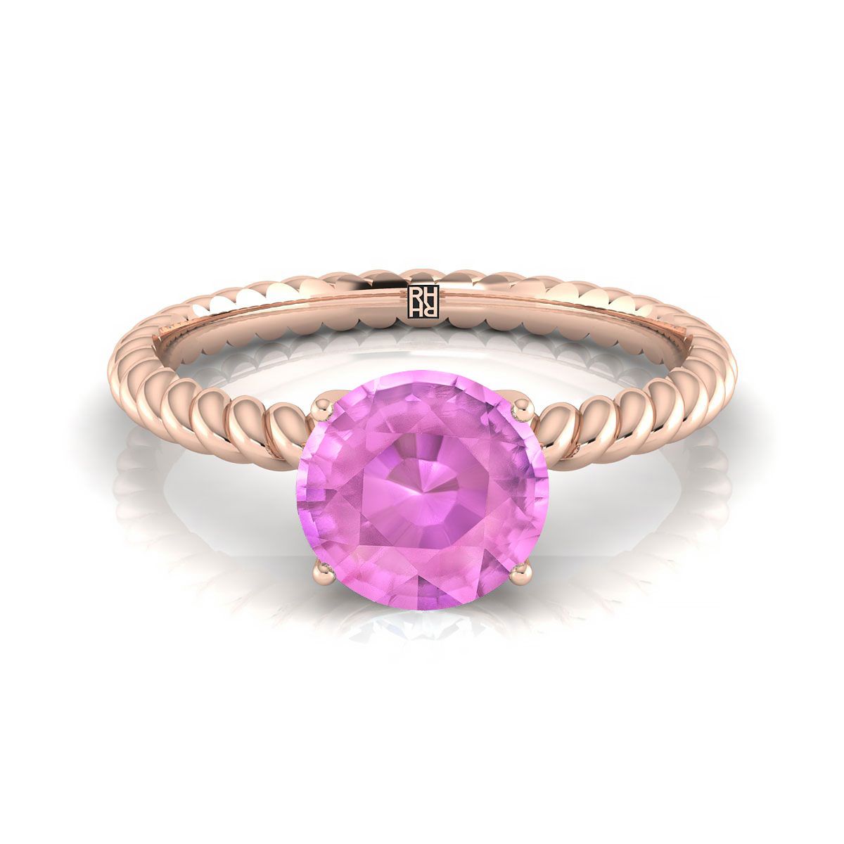 แหวนหมั้นทองคำ 14K ชมพูแซฟไฟร์ทรงกลมเจียระไนแบบ Brilliant สีชมพู พร้อมเชือกบิดเดี่ยวและเพชรเซอร์ไพรส์