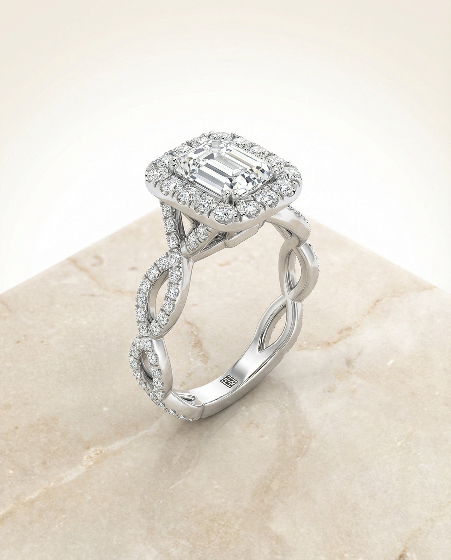 European Cut, Ribbon Twist Pavé Halo Emerald, in Platinum, pave setting – angled view | RockHer