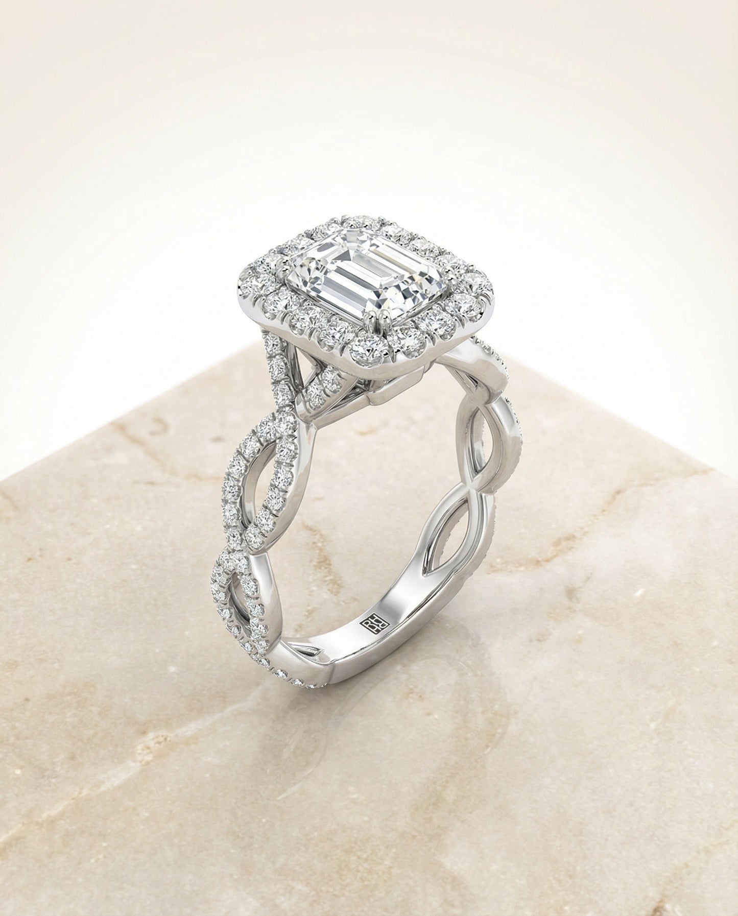 European Cut, Ribbon Twist Pavé Halo Emerald, in Platinum, pave setting – angled view | RockHer