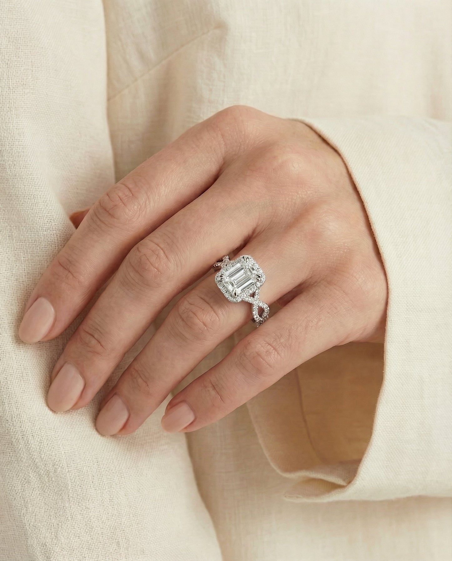European Cut, Ribbon Twist Pavé Halo Emerald, in Platinum, pave setting – lifestyle shot | RockHer