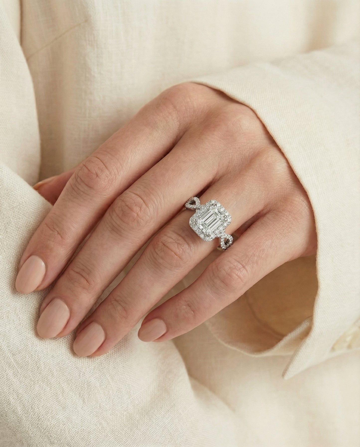 European Cut, Ribbon Twist Pavé Halo Emerald, in Platinum, pave setting – lifestyle shot | RockHer