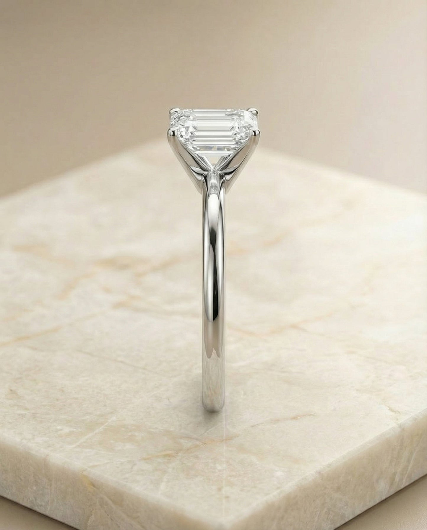 European Cut, Round Comfort Fit Claw Prong Solitaire Emerald, in 18K White Gold – side profile | RockHer