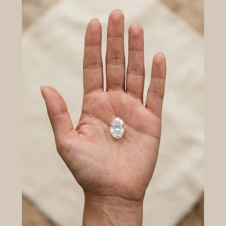 1-3/4 Carat Oval Lab Grown Diamond — true-scale on open palm