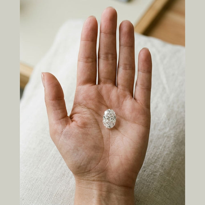 2 Carat Oval Lab Grown Diamond — true-scale on open palm