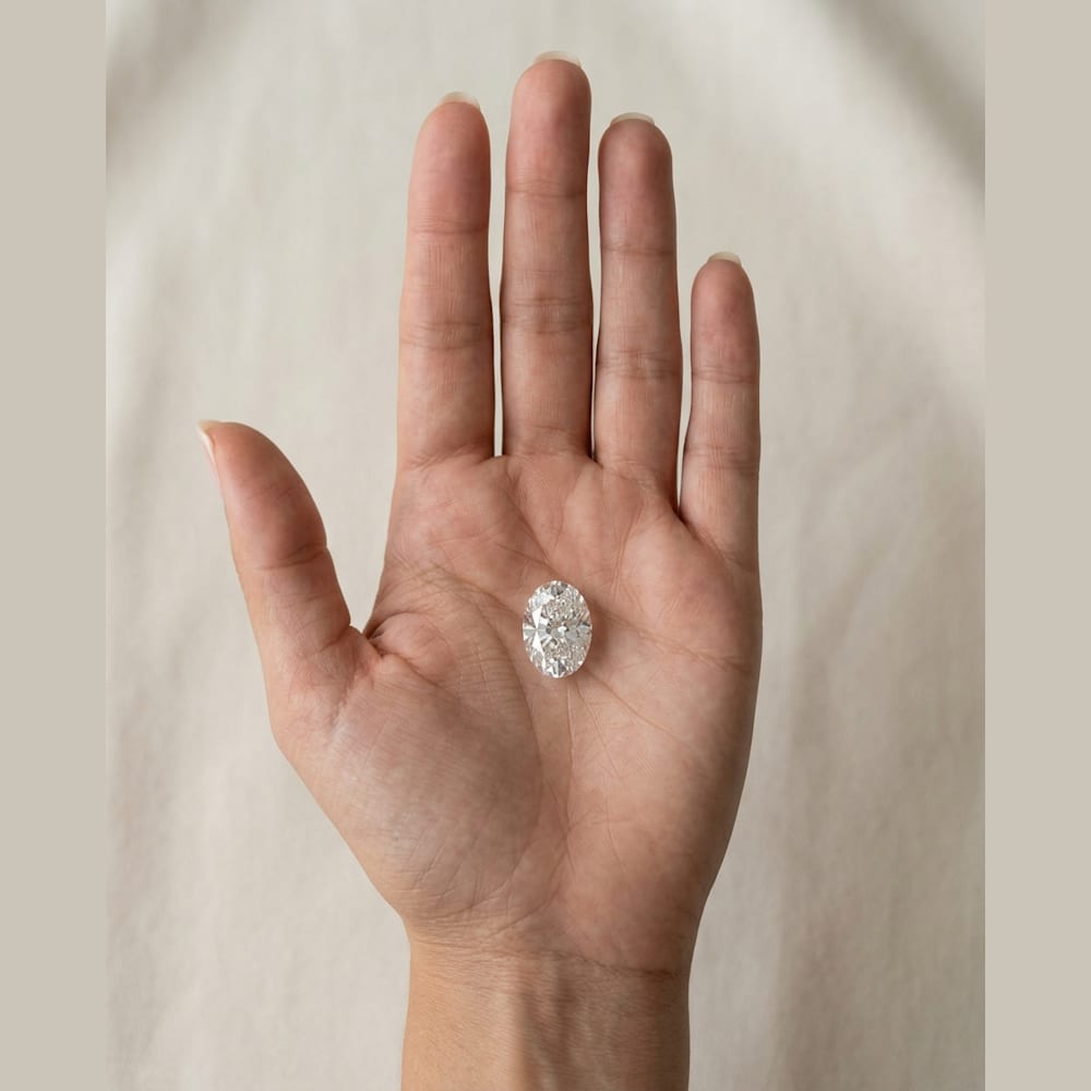 2-1/2 Carat Oval Lab Grown Diamond — true-scale on open palm