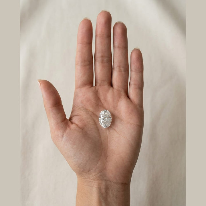 2-1/2 Carat Oval Lab Grown Diamond — true-scale on open palm
