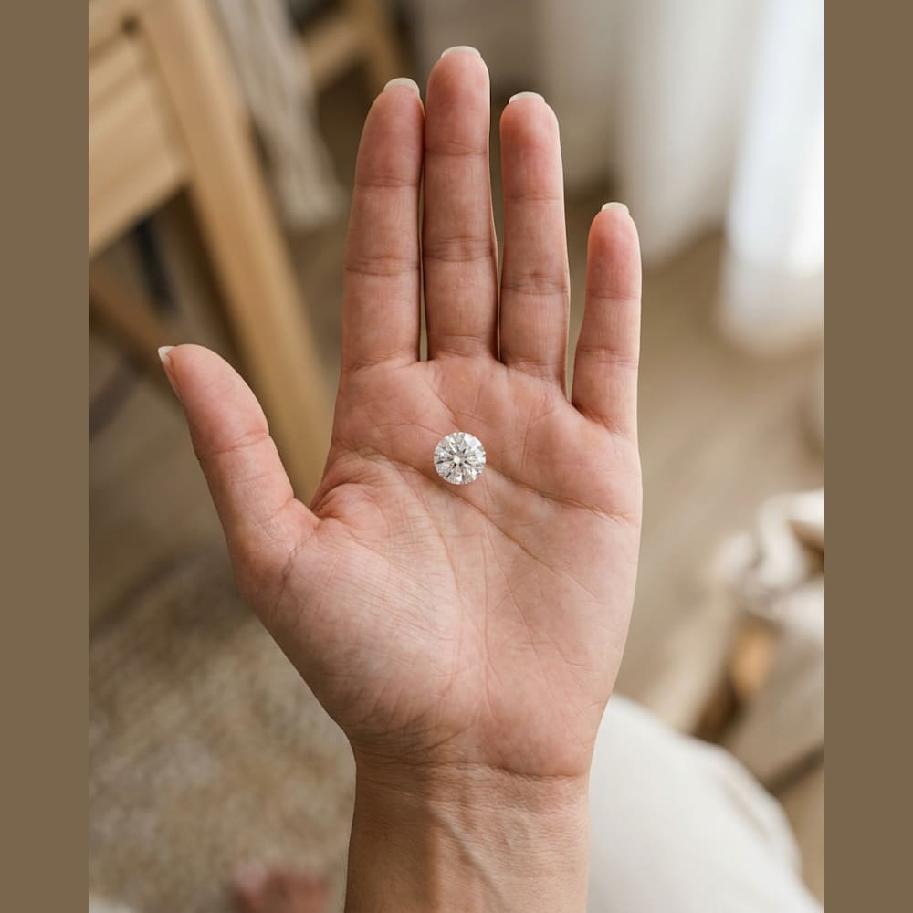 1-1/2 Carat Round Lab Grown Diamond — true-scale on open palm