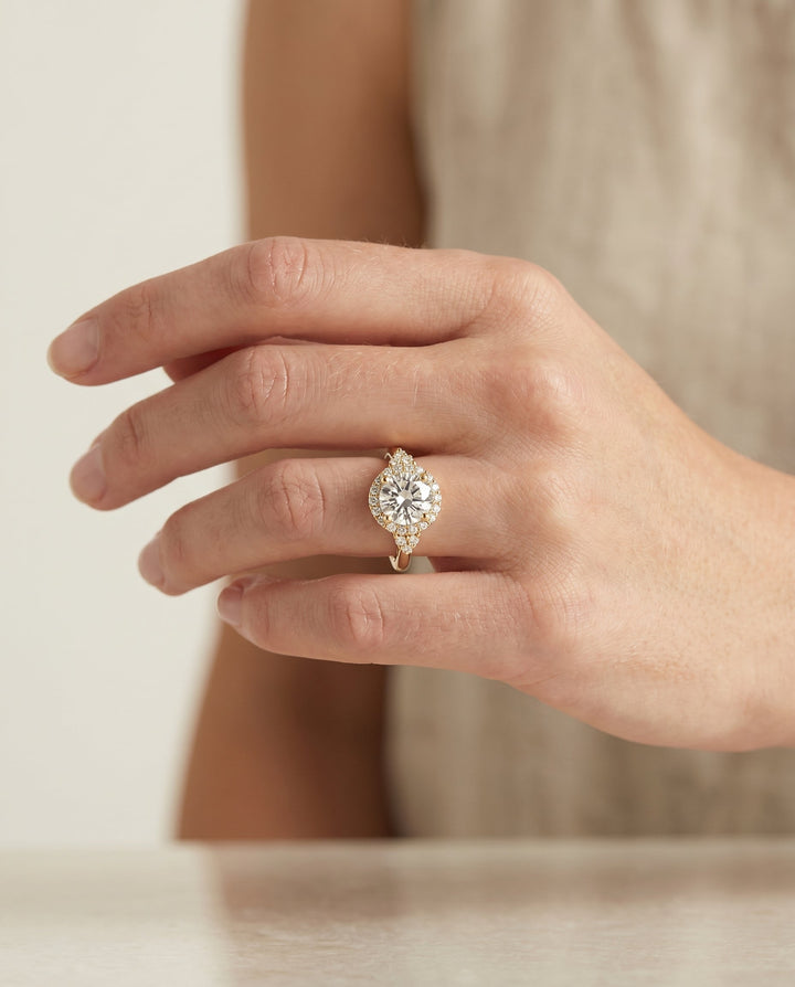 Round Brilliant, Scroll Gallery Halo, in 18K Yellow Gold, pave setting – lifestyle shot | RockHer
