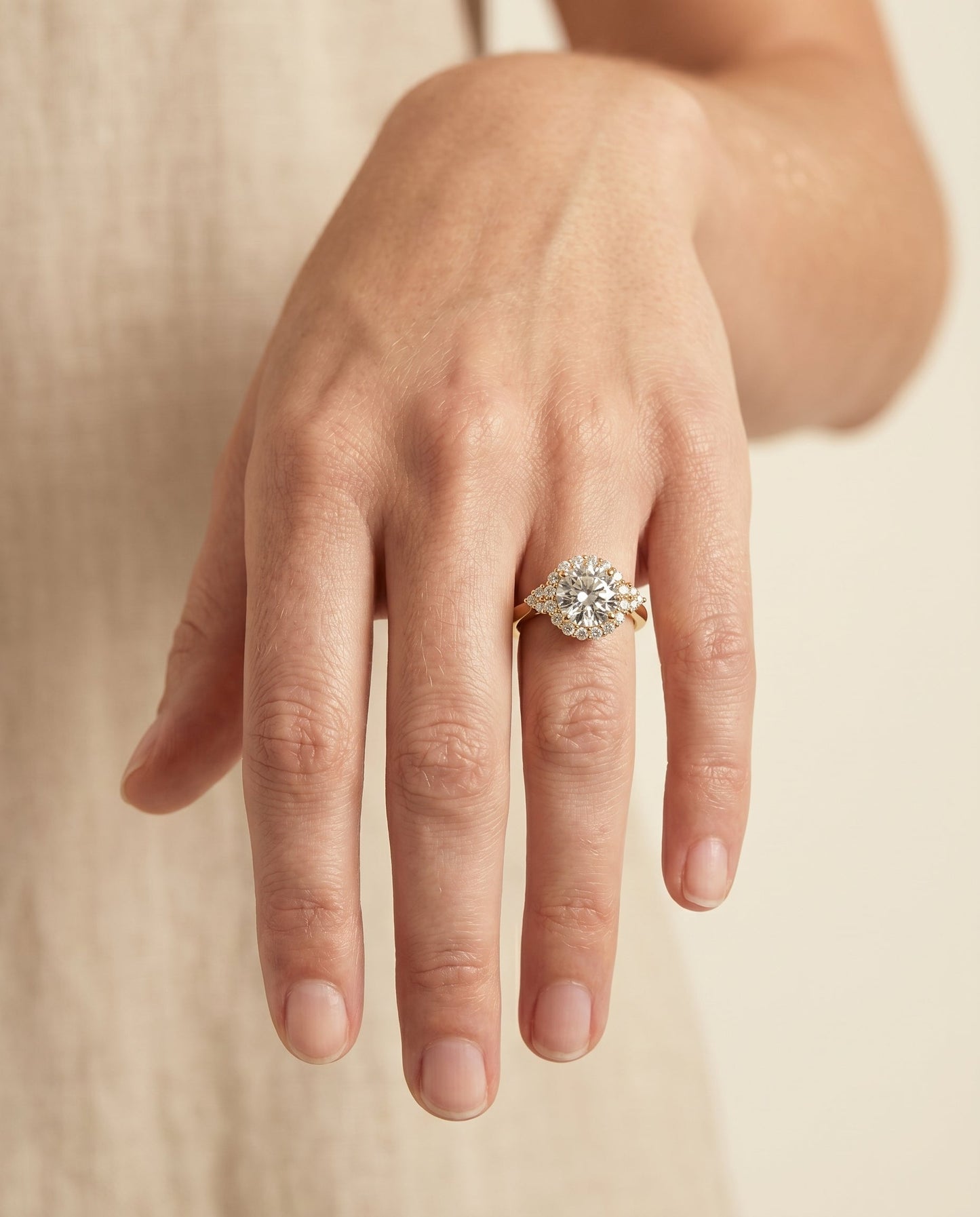 Round Brilliant, Scroll Gallery Halo, in 18K Yellow Gold, pave setting – lifestyle shot | RockHer