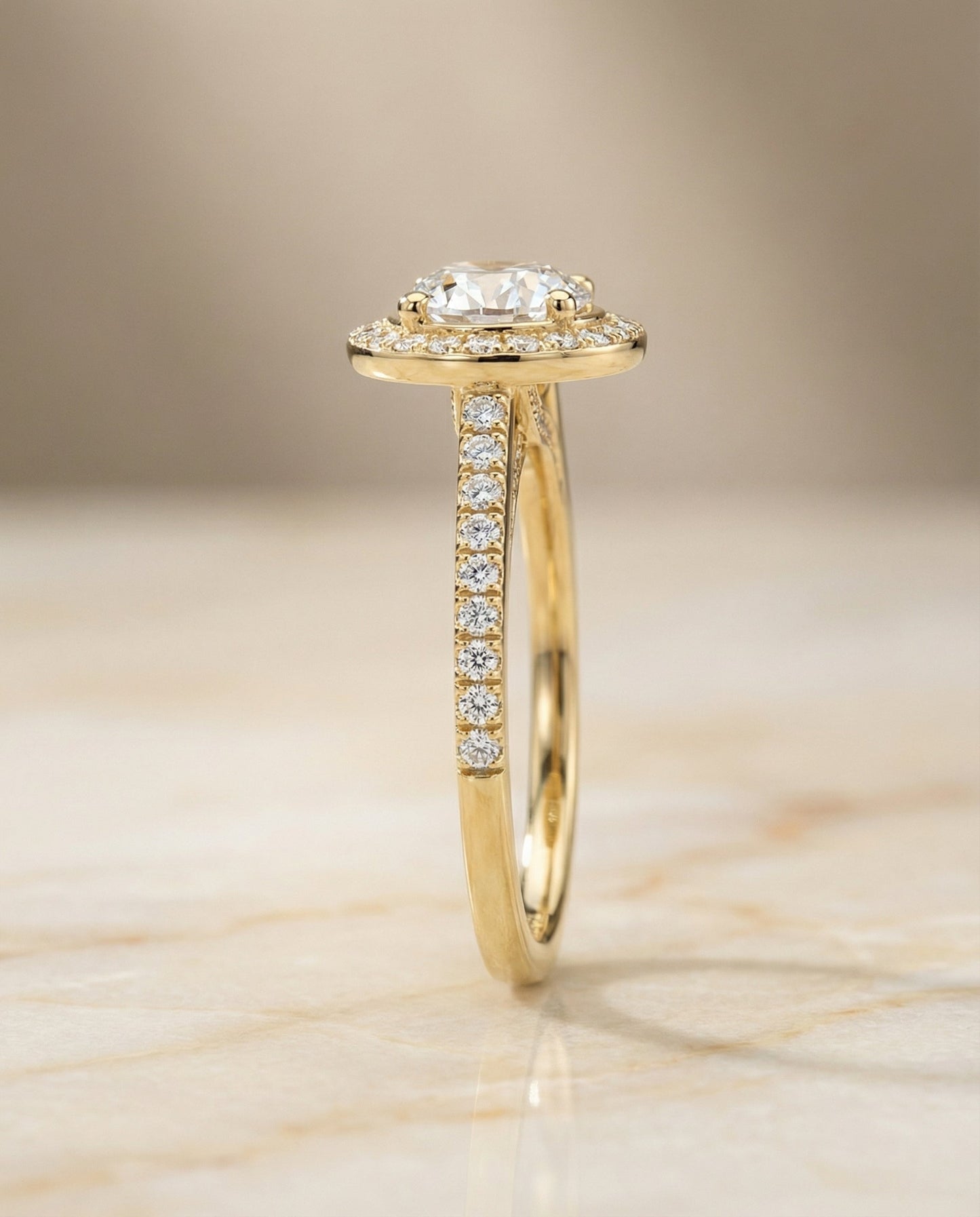 Round Brilliant, Secret Gallery French Pavé Halo, in 18K Yellow Gold – side profile | RockHer
