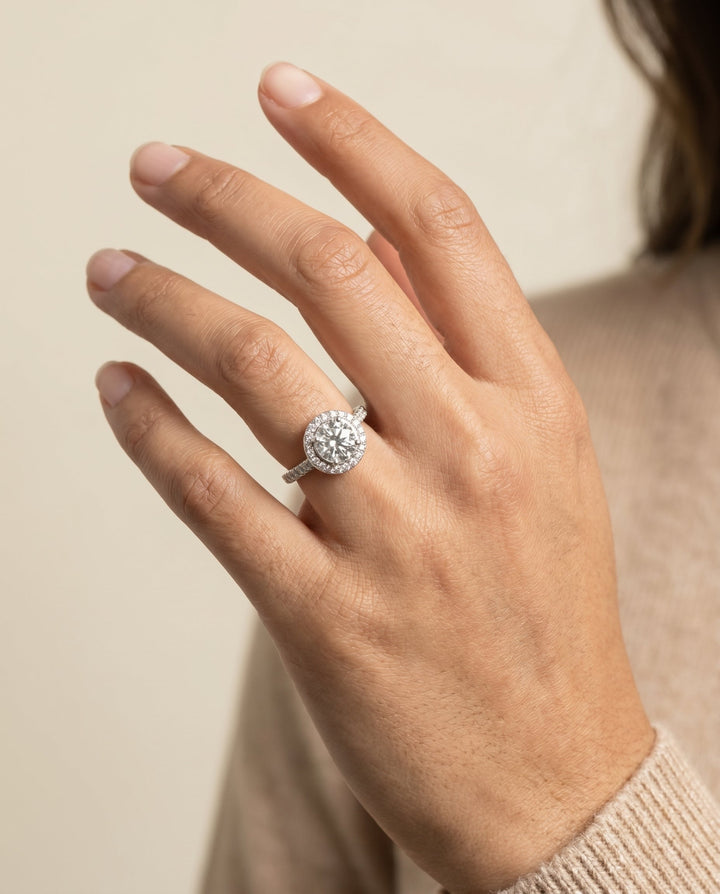Round Brilliant, Secret Gallery French Pavé Halo, in 18K White Gold – lifestyle shot | RockHer