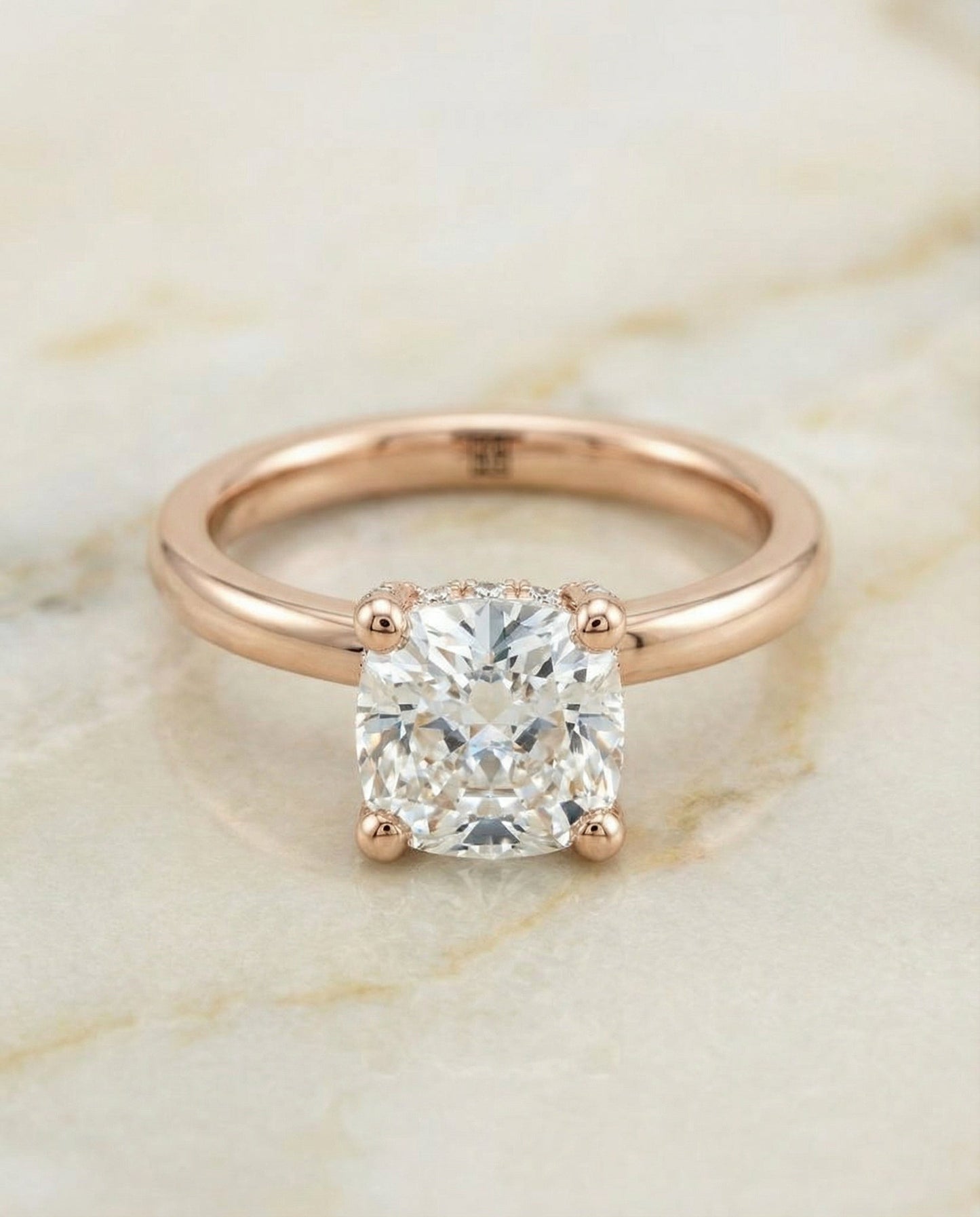 Secret Halo Adorned Prong Solitaire Cushion, in 14K Rose Gold – angled view | RockHer