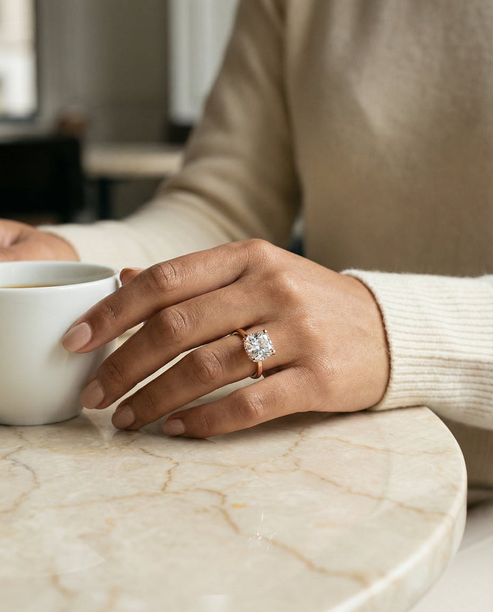 Secret Halo Adorned Prong Solitaire Cushion, in 14K Rose Gold – lifestyle shot | RockHer