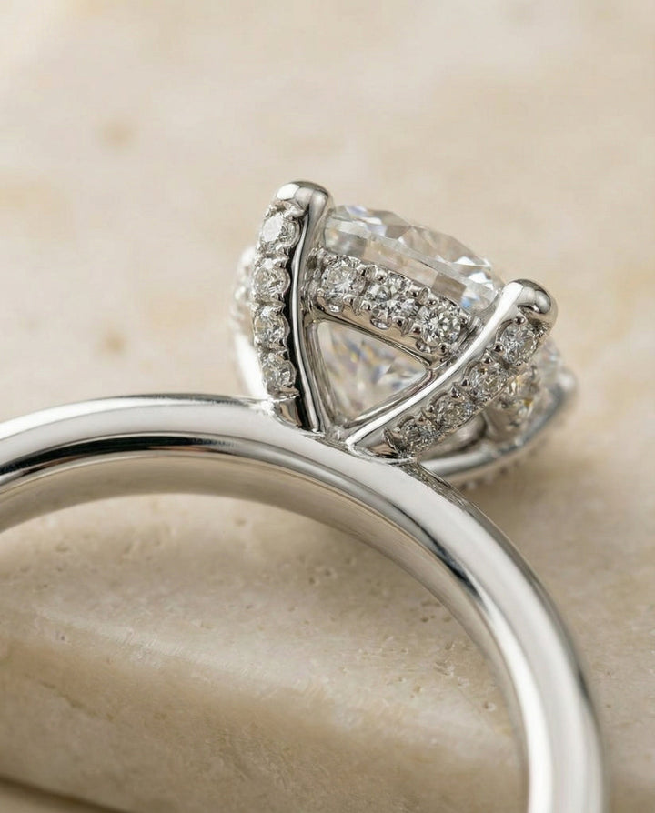 Round Brilliant, Secret Halo Adorned Prong Solitaire, in Platinum – detail view | RockHer