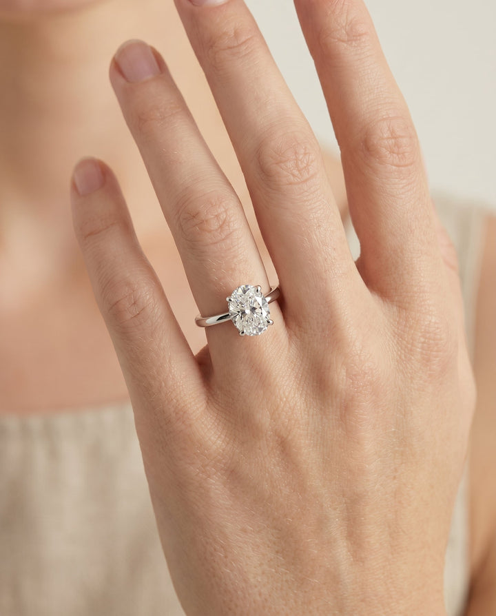 Lana Select Secret Halo Adorned Prong Solitaire Oval in 18K White Gold – view 3