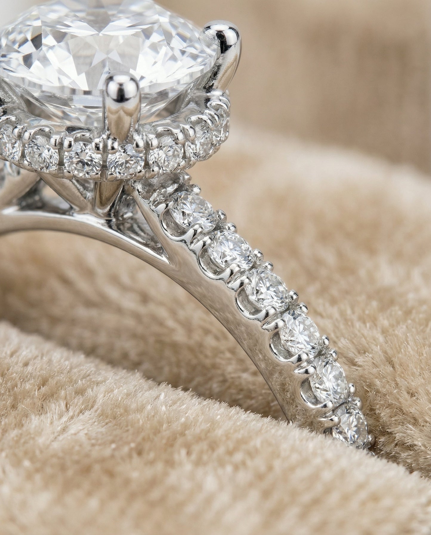 Round Brilliant, Secret Halo French Pavé Solitaire, in Platinum – detail view | RockHer