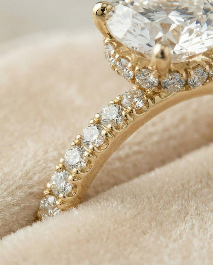 Round Brilliant, Secret Halo French Pavé Solitaire, in 18K Yellow Gold – detail view | RockHer