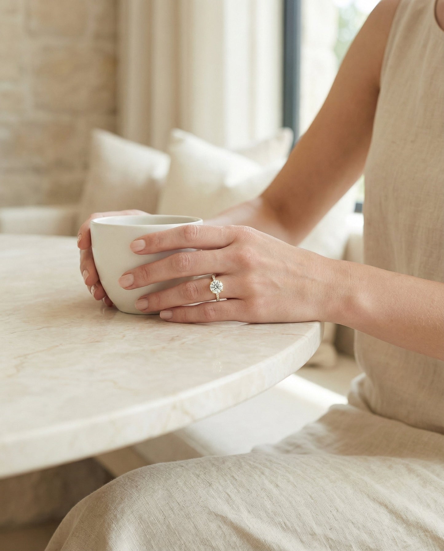 Round Brilliant, Secret Halo French Pavé Solitaire, in 18K Yellow Gold – lifestyle shot | RockHer