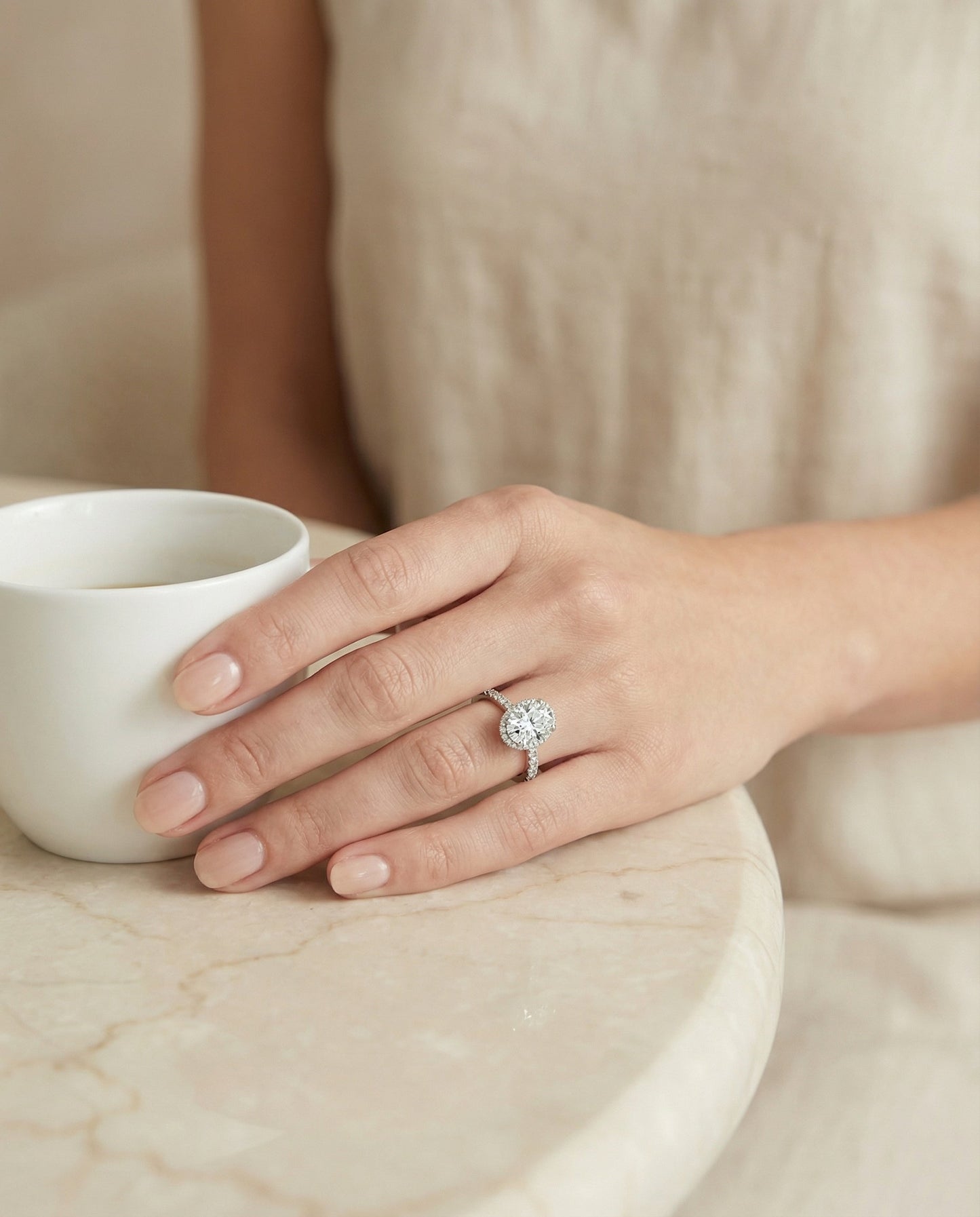 Elliott Select secret halo french pavé solitaire oval oval ring in 14K White Gold — lifestyle — RockHer