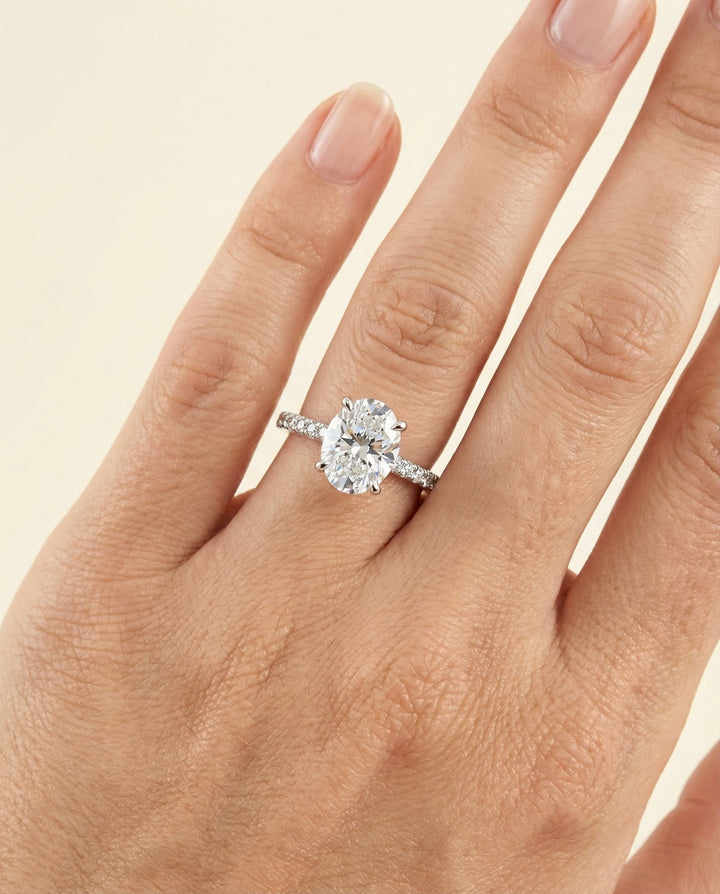 Secret Halo French Pavé Solitaire Oval, in Platinum – lifestyle shot | RockHer