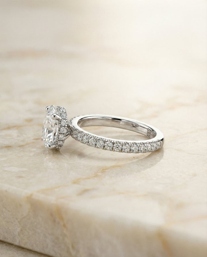 Elliott Select secret halo french pavé solitaire oval oval ring in 14K White Gold — side — RockHer